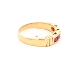 Anillo de Oro Amarillo 18K Cintillo con Rubíes y Diamante