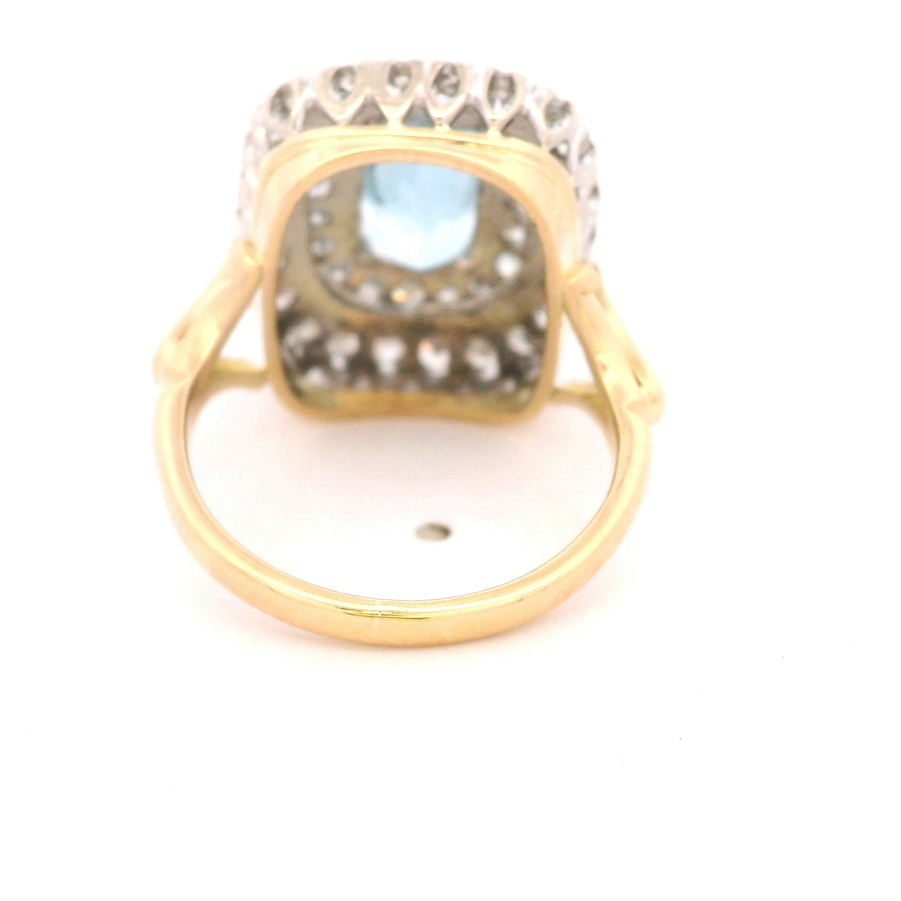 Anillo de Oro Amarillo y Blanco 18K Halo con Diamantes y Piedra Azul