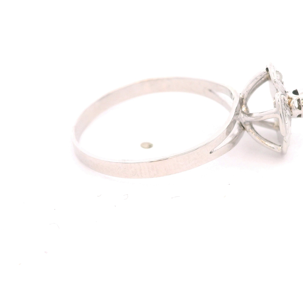 Anillo de Oro Blanco 18K Flor Rodinado con Diamante