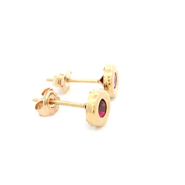 Aros De Oro Amarillo 18K Punto De Luz Fucsia 