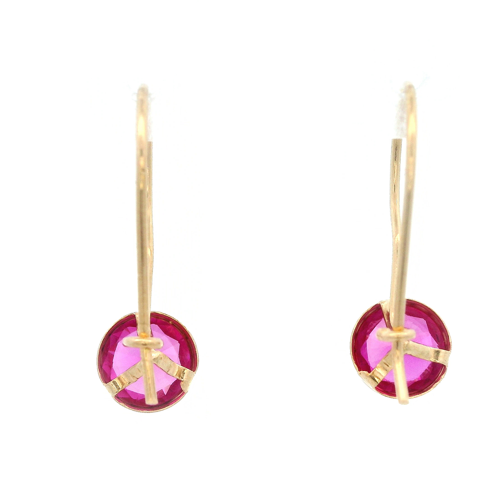 Aros De Oro Amarillo 18K Punto De Luz Fucsia