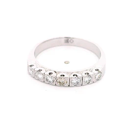 Anillo de Oro Blanco 18K Cintillo Rodinado con 7 Diamantes