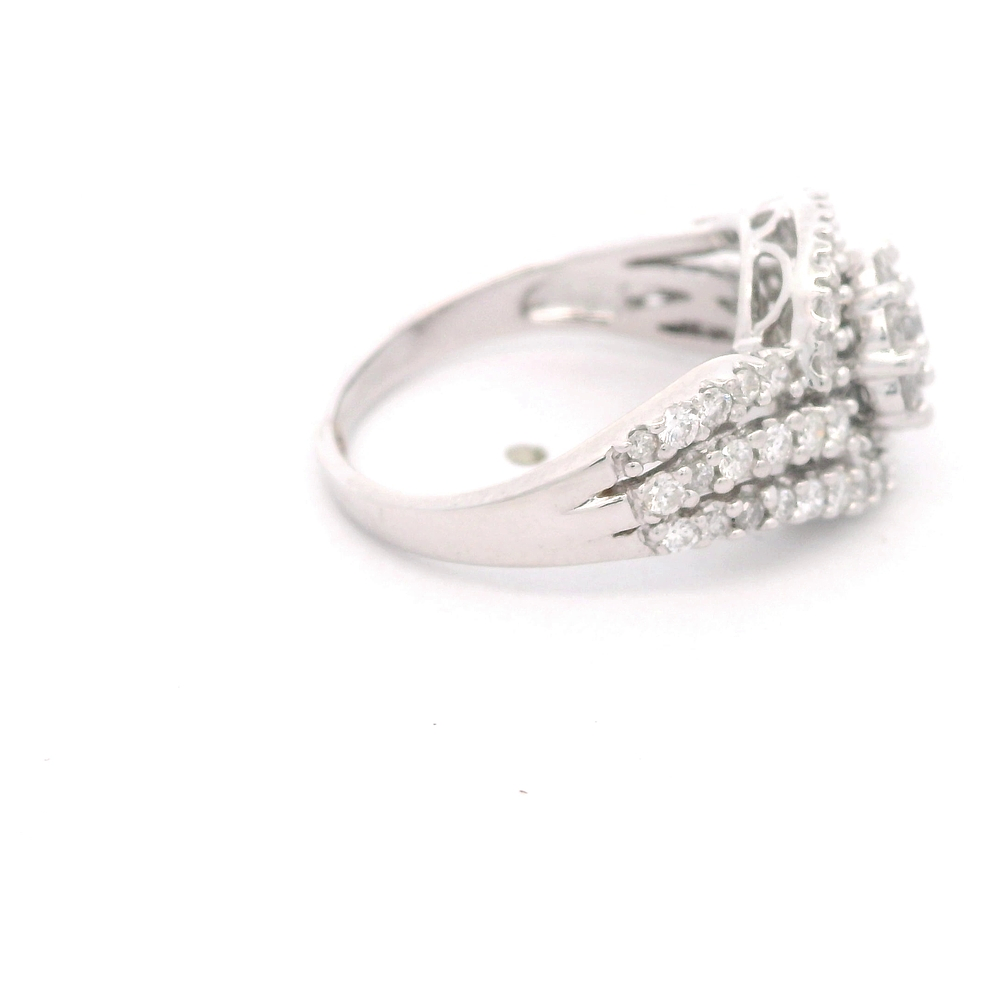 Anillo de Oro Blanco 18K Halo Cintillo Rodinado con Diamantes