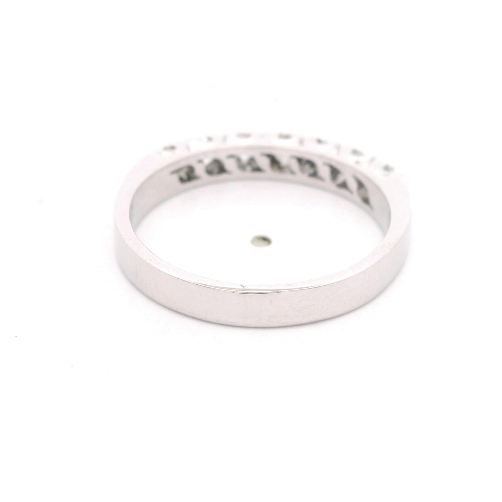 Anillo de Oro Blanco 18K Cintillo Rodinado con 7 Diamantes