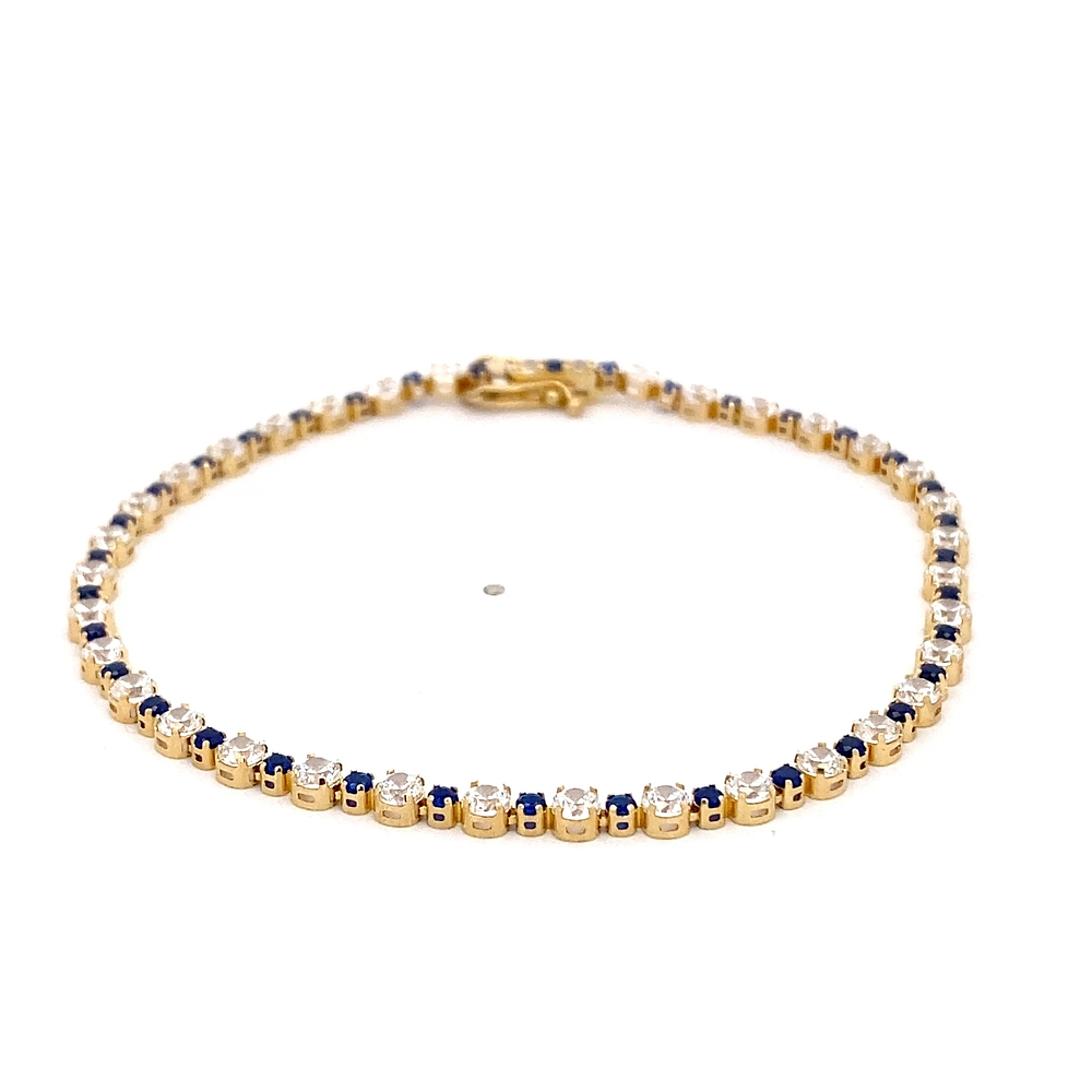 Pulsera de Oro Amarillo 18K Tenis con Piedras Incoloras y Azules