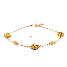 Pulsera de Oro Amarillo 18K Limada con Flores de Trébol Talladas con Esferas