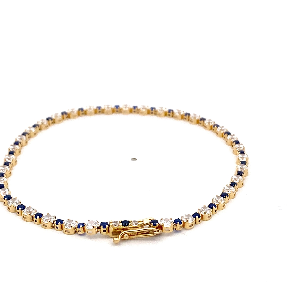 Pulsera de Oro Amarillo 18K Tenis con Piedras Incoloras y Azules