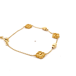 Pulsera de Oro Amarillo 18K Limada con Flores de Trébol Talladas con Esferas
