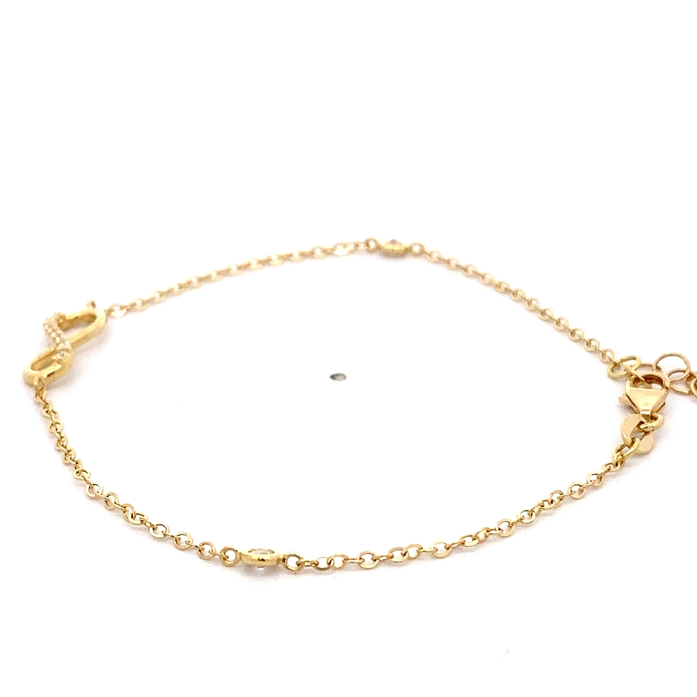 Pulsera de Oro Amarillo 18K Labrada con Dije Infinito y Punto de Luz