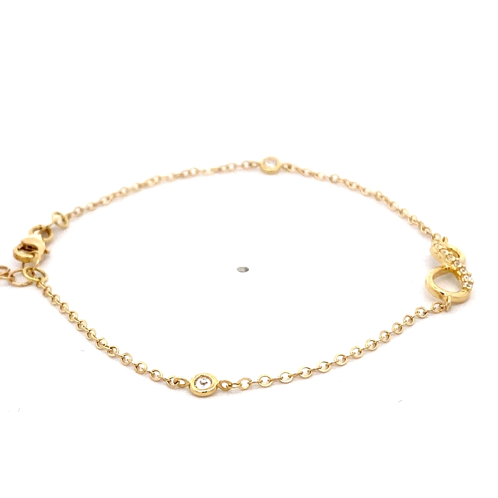 Pulsera de Oro Amarillo 18K Labrada con Dije Infinito y Punto de Luz