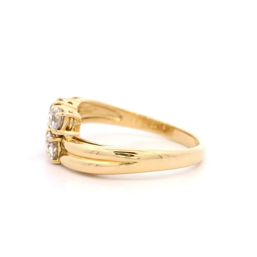 Anillo de Oro Amarillo 18K Crossed con 4 Diamantes