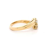 Anillo de Oro Amarillo 18K Crossed con 4 Diamantes