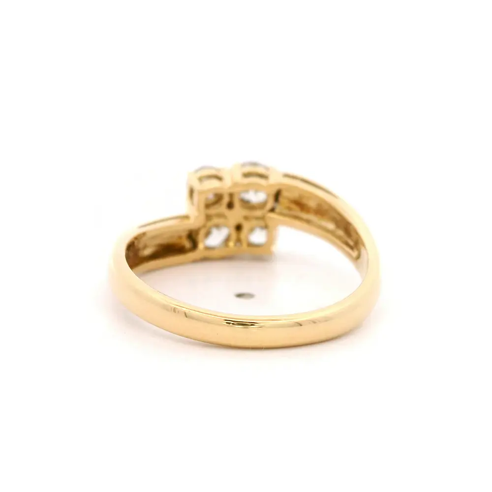 Anillo de Oro Amarillo 18K Crossed con 4 Diamantes