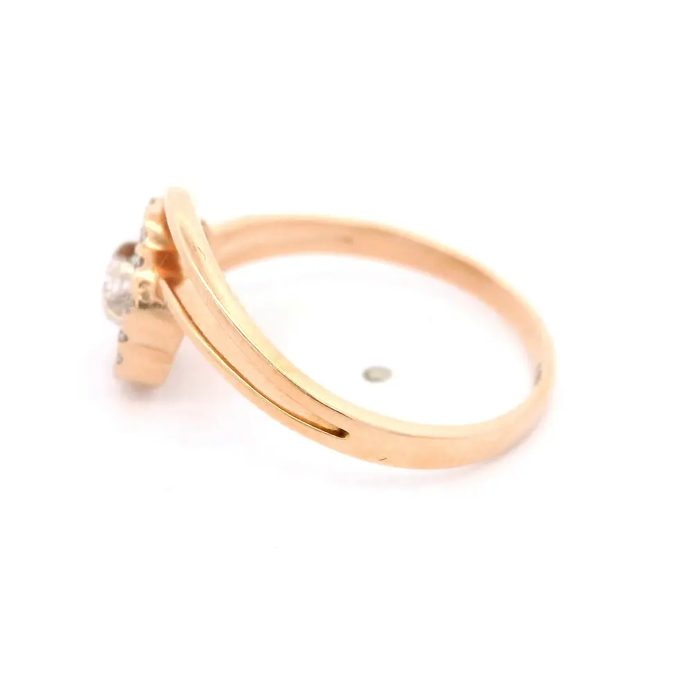 Anillo Flor Calada 14K Oro Rosado con 16 Diamantes