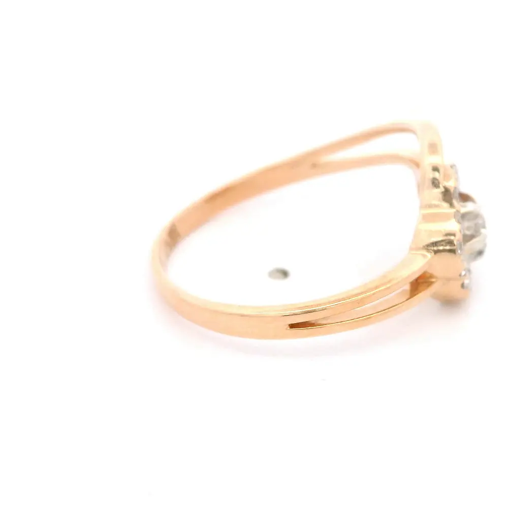Anillo Flor Calada 14K Oro Rosado con 16 Diamantes