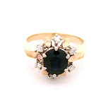 Anillo Flor 10K Oro Amarillo con 6 Diamantes y Zafiro