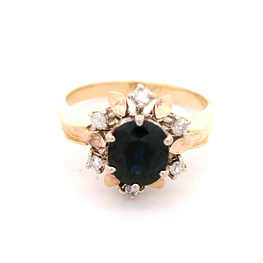 Anillo Flor 10K Oro Amarillo con 6 Diamantes y Zafiro