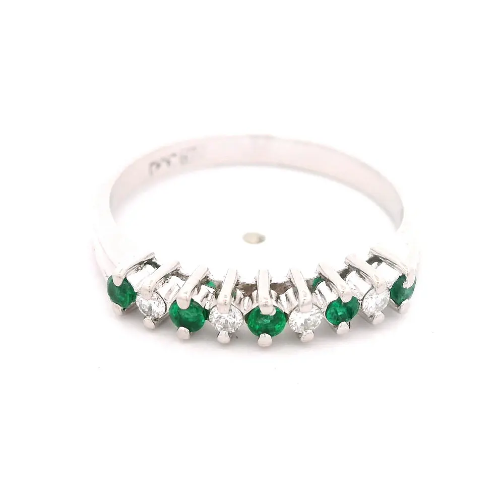 Anillo Cintillo de Platino con 4 Diamantes y 5 Esmeraldas