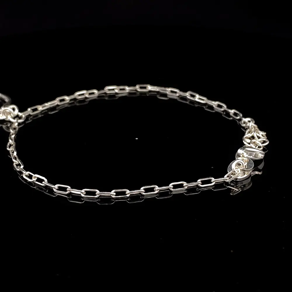 Pulsera de Plata Limada con Corazón Troquelado y Corazón con Circón Incoloro