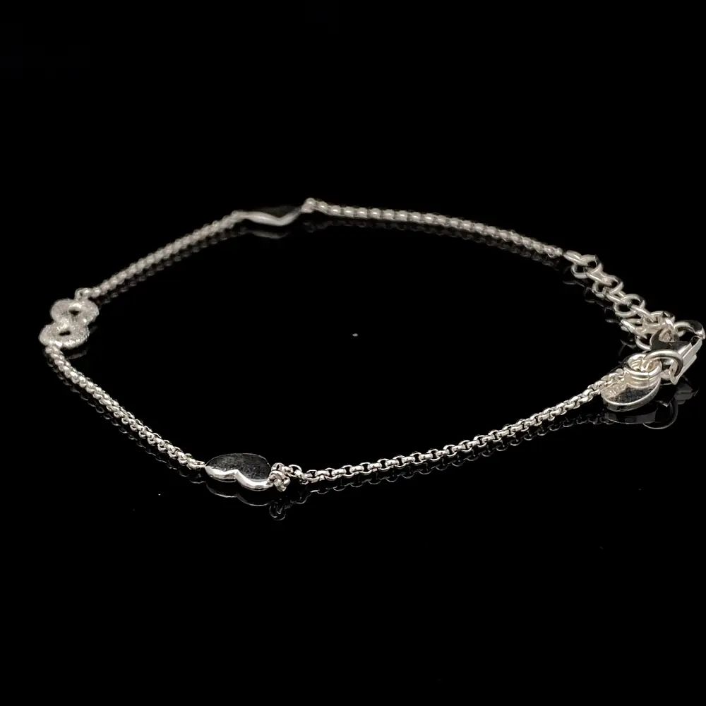 Pulsera de Plata Limada con Infinito Diamantado y Corazones Lisos