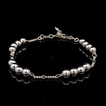 Pulsera de Plata Fígaro 3x1 con Cuatro Esferas Intercaladas