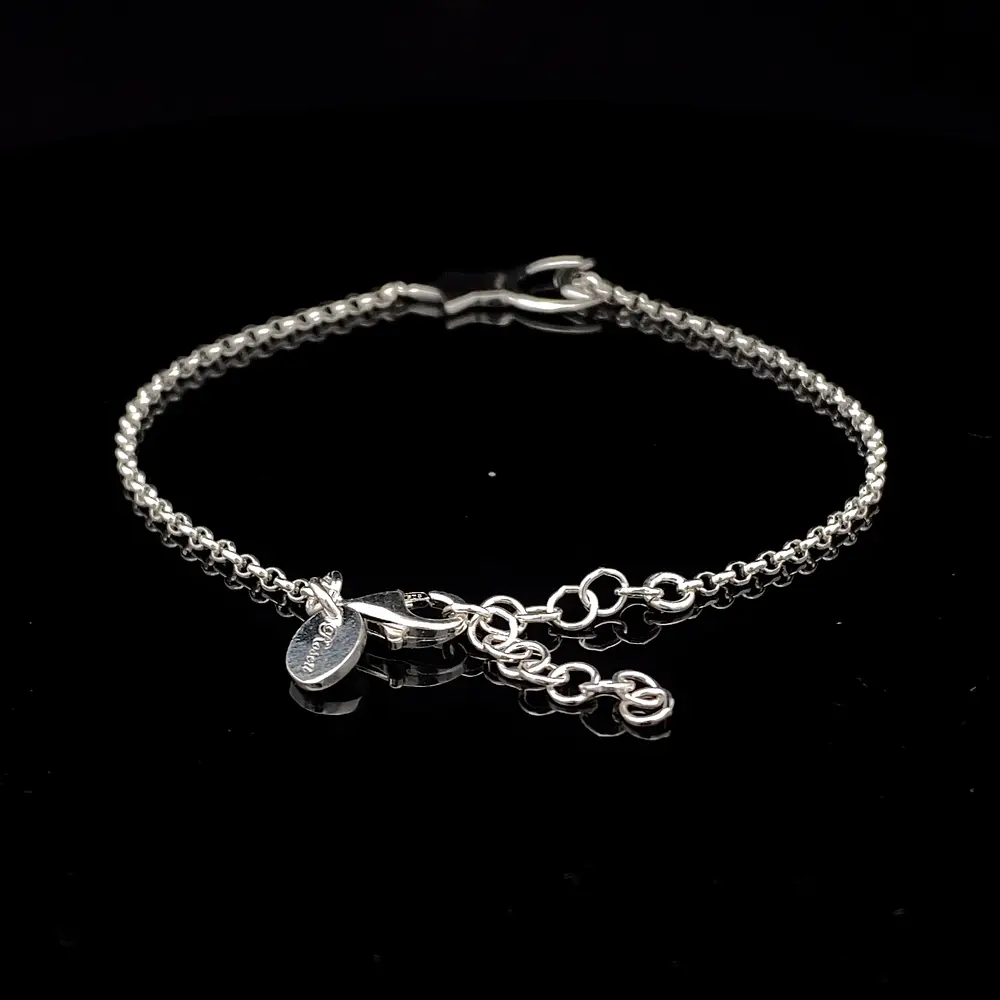 Pulsera de Plata Rolo con Estrella Lisa y Luna Troquelada