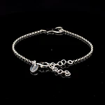 Pulsera de Plata Rolo con Estrella Lisa y Luna Troquelada