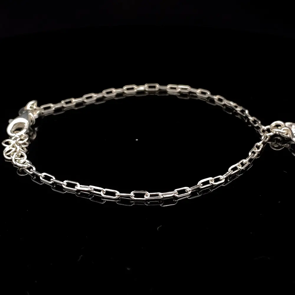 Pulsera de Plata Limada con Corazón Troquelado y Corazón con Circón Incoloro