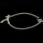 Pulsera de Plata Rolo con Estrella Lisa y Luna Troquelada