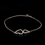 Tobillera de Plata con Dos Corazones y Piedras Incoloras Incrustadas