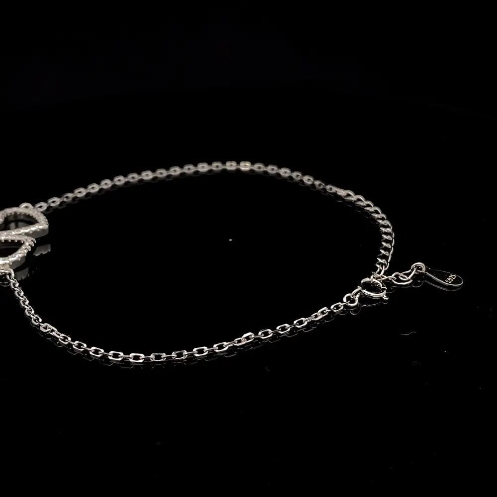 Tobillera de Plata con Dos Corazones y Piedras Incoloras Incrustadas