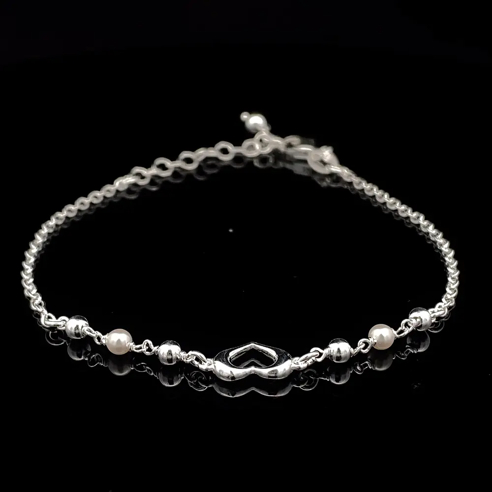 Pulsera de Plata Limada con Corazón Central y Esferas Continuas