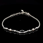 Pulsera de Plata Limada con Corazón Central y Esferas Continuas
