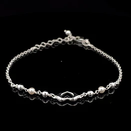 Pulsera de Plata Limada con Corazón Central y Esferas Continuas