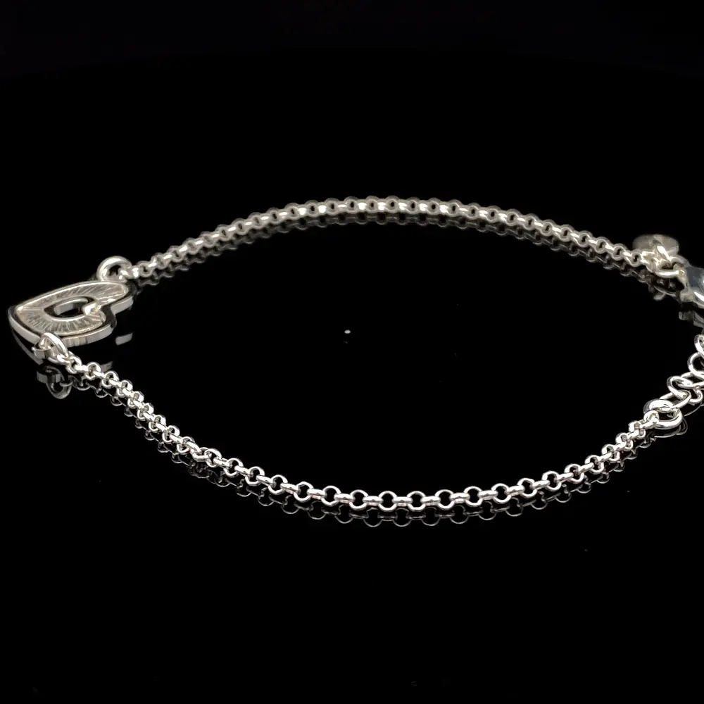 Pulsera de Plata Rolo con Corazón Central Troquelado
