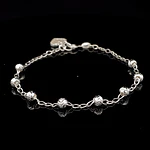 Pulsera de Plata Bilbao con Esferas Talladas y Corazón Final