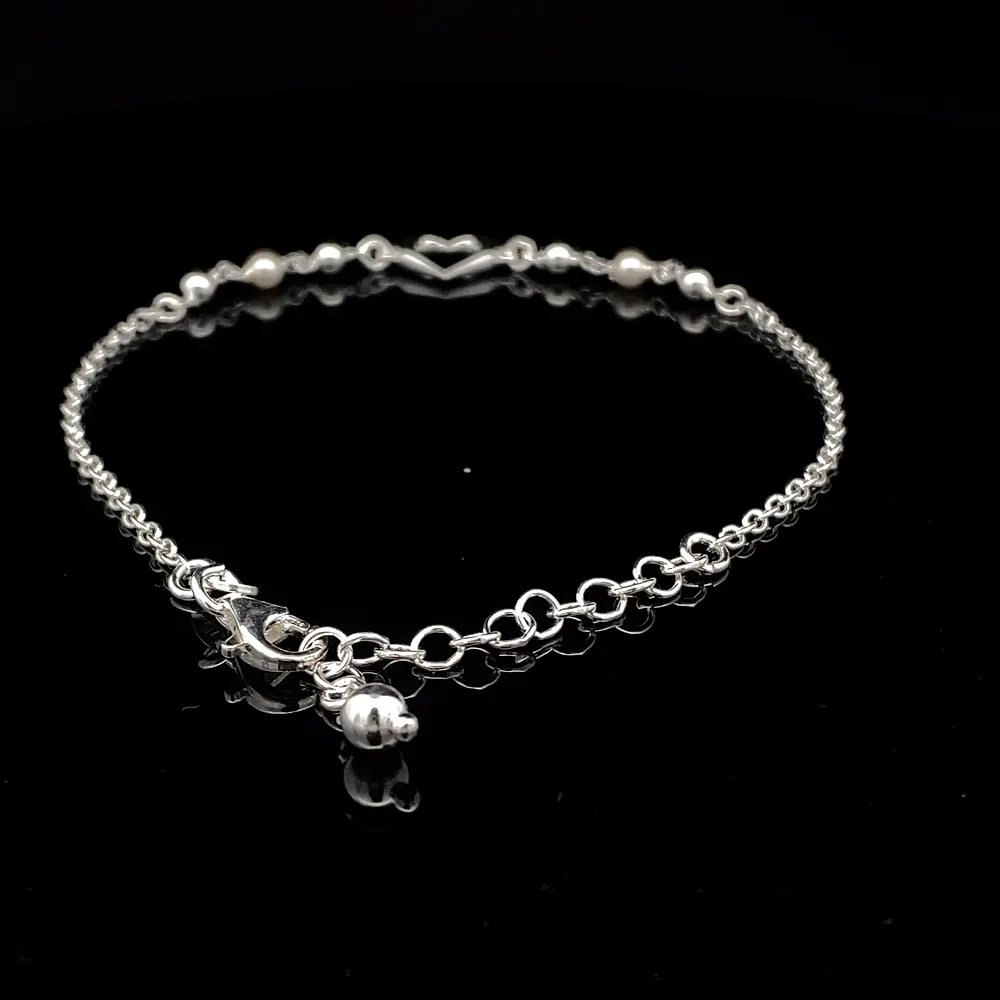 Pulsera de Plata Limada con Corazón Central y Esferas Continuas