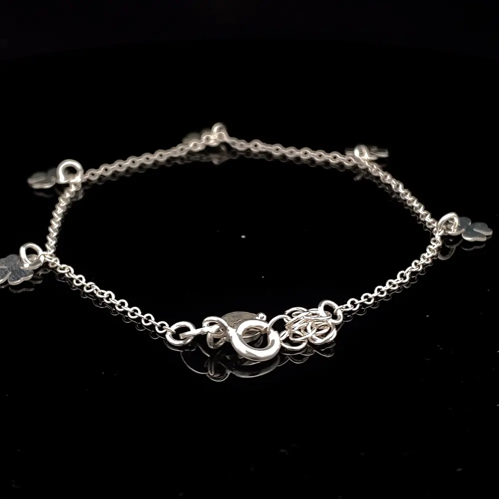 Pulsera de Plata Rolo con Tréboles Intercalados