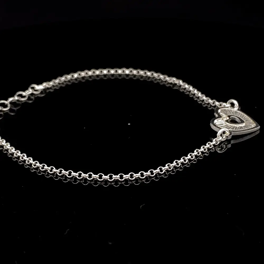 Pulsera de Plata Rolo con Corazón Central Troquelado