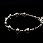 Pulsera de Plata Bilbao con Esferas Talladas y Corazón Final