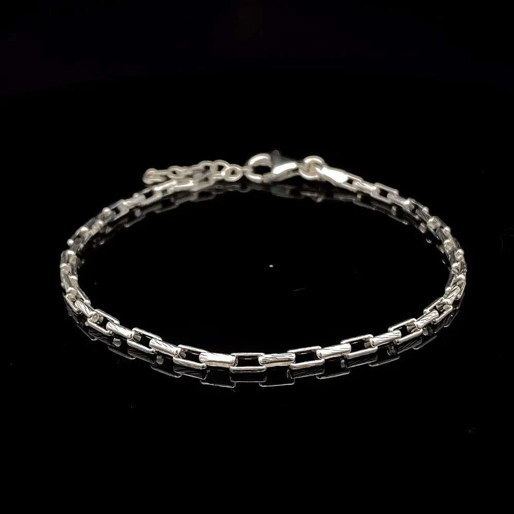 Pulsera de Plata Limada con Diseño Trenzado en Eslabones