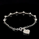 Pulsera de Plata Bilbao con Esferas Talladas y Corazón Final