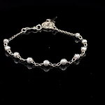Pulsera de Plata Denario con Esferas Talladas