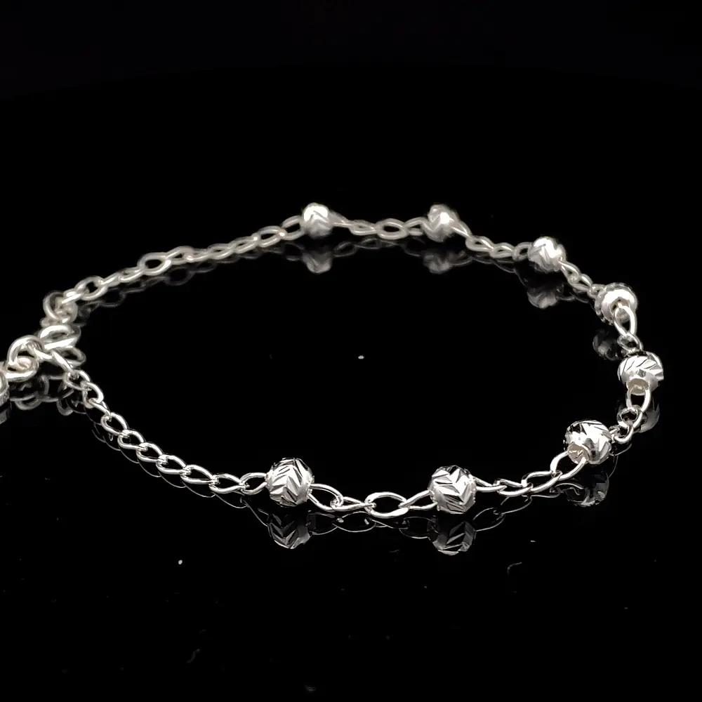Pulsera de Plata Bilbao con Esferas Talladas y Corazón Final