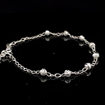 Pulsera de Plata Bilbao con Esferas Talladas y Corazón Final