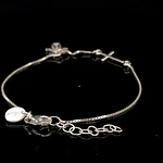 Pulsera de Plata Veneciana con Cruz Central y Ángel Colgante