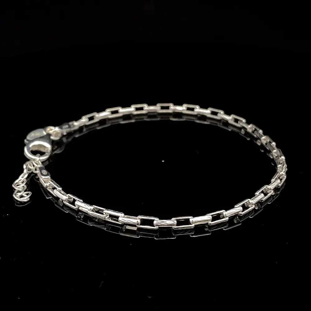 Pulsera de Plata Limada con Diseño Trenzado en Eslabones