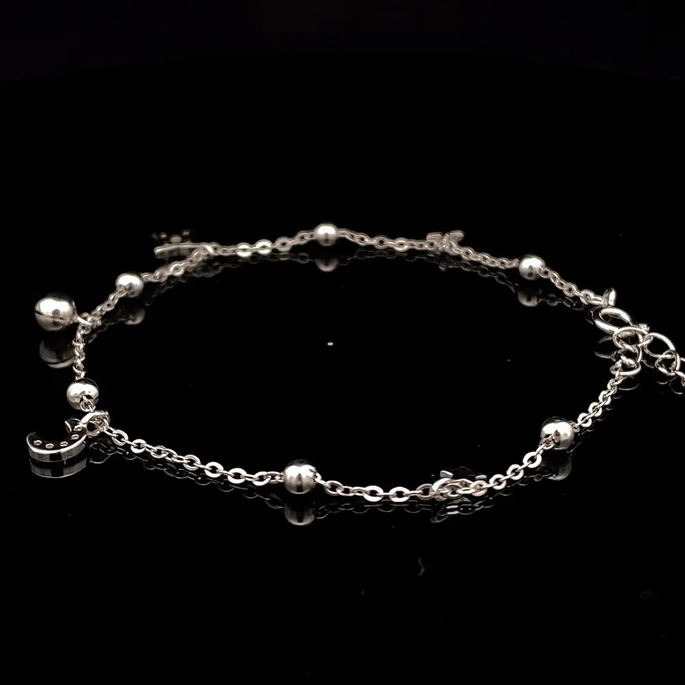 Pulsera de Plata Limada con Esferas Intercaladas, Luna, Estrella y Esfera Colgante