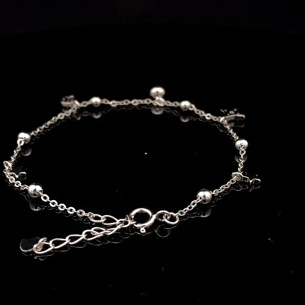 Pulsera de Plata Limada con Esferas Intercaladas, Luna, Estrella y Esfera Colgante