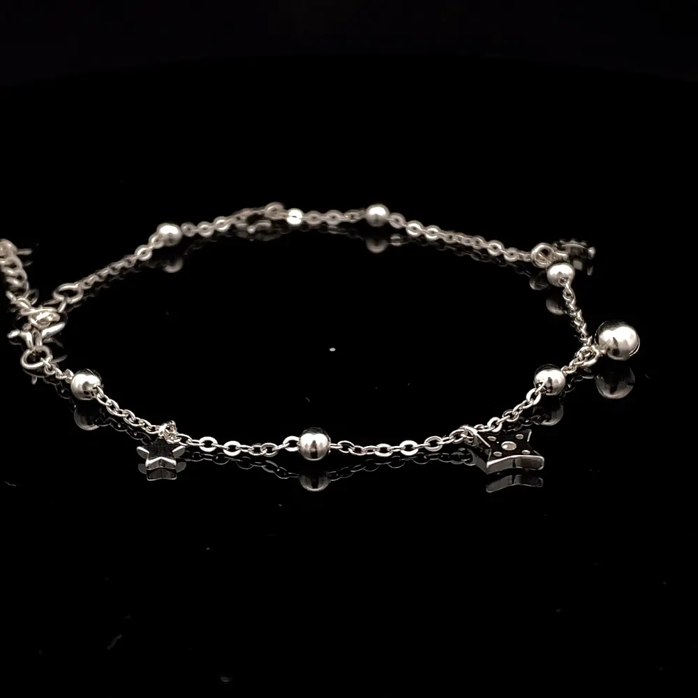 Pulsera de Plata Limada con Esferas Intercaladas, Luna, Estrella y Esfera Colgante